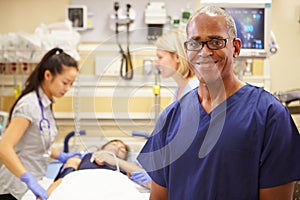 Portrait Of Male Nurse Working In Emergency Room