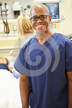 Portrait Of Male Nurse Working In Emergency Room