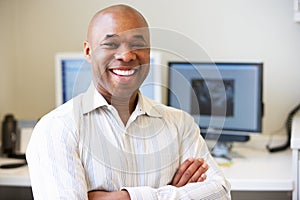 Portrait Of Male Obstetrician In Hospital photo