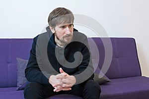 Portrait of a male psychologist in an office for a consultation. Healthcare concept, social issues