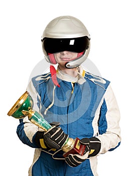 Portrait of a male racer winner with a gold trophy cup isolated on white