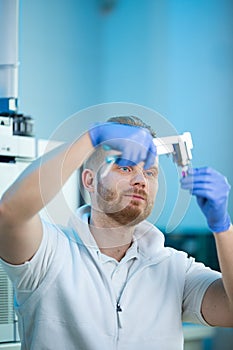 Portrait of a male researcher carrying out scientific research