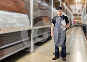 Portrait of male staff warehouse operator