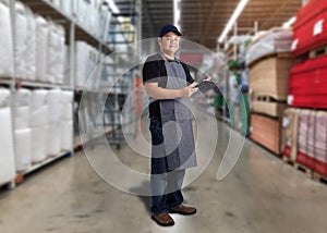 Portrait of male staff warehouse operator