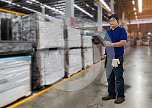 Portrait of male staff warehouse operator