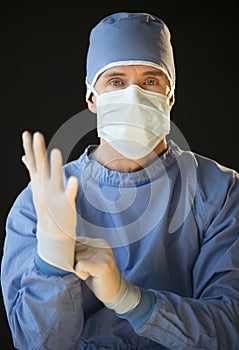 Portrait Of Male Surgeon Preparing For Surgery