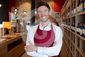 portrait male vendor in distillery shop