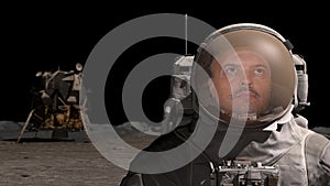 Portrait of man astronaut on Moon wearing helmet looking at earth globe in outer space closeup. Sci-fi expedition