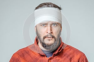 Portrait of man with bandage