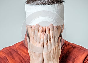 Portrait of man with bandage