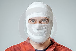 Portrait of man bandaged up