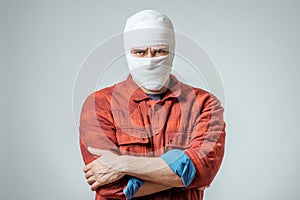 Portrait of man bandaged up