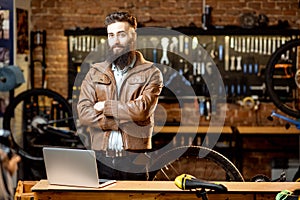 Portrait of a man in the bicycle store