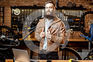 Portrait of a man in the bicycle store