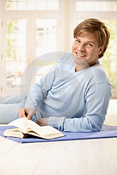 Portrait of man with book