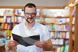 Portrait of a man in a bookstore