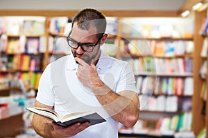 Portrait of a man in a bookstore