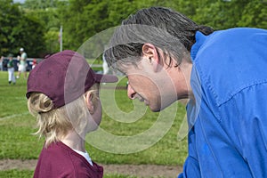 Portrait of a man/coach and his son