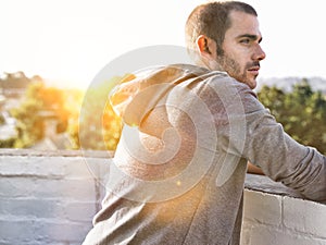 Portrait of man contemplating after jogging