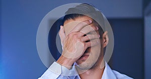 Portrait of man covering face like facepalm expressing frustration or shame. Businessman is disappointed and covers his