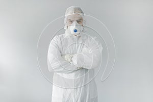 Portrait of man doctor in protective clothes during coronavirus pandemic.