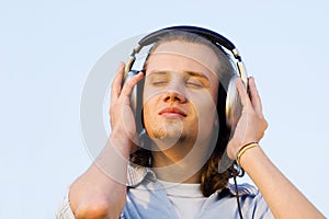 Portrait of a man with earphones