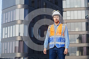 portrait man engineer standing working standing at rooftop building construction. Male technician worker working checking hvac of