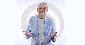 Portrait of man expressing frustration over white background. Concept of emotions.