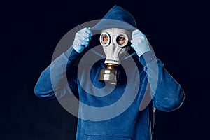 Portrait of a man in a gas mask. Panic during quarantine. Coronavirus pandemia