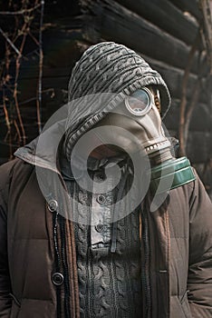 Portrait of a man in a gas mask. Panic during quarantine. Coronavirus pandemia concept. Stalker in a gas mask, Chernobyl Exclusion