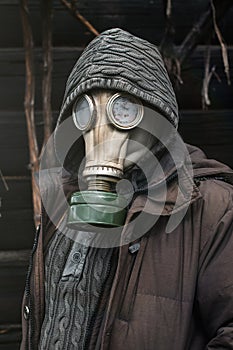 Portrait of a man in a gas mask. Panic during quarantine. Coronavirus pandemia concept. Stalker in a gas mask, Chernobyl Exclusion