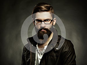 Portrait of man with glasses and beard