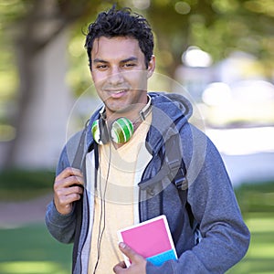 Portrait, man and happy student at park, university or outdoor campus in summer. Face, scholarship and smile of young