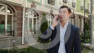 Portrait man having mobile conversation. Man talking phone about business