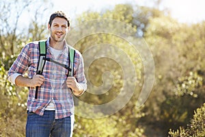 Portrait Of Man Hiking In Countryside