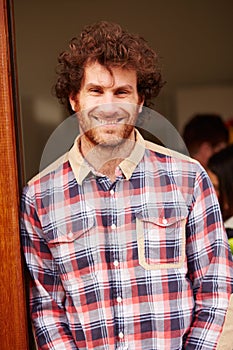 Portrait Of Man Leaning In Doorway