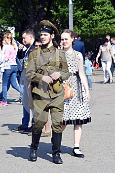 Portrait of a man in military uniform and a woman in historic dress