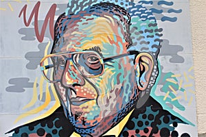 A portrait of man at the mural painted by Alain Welter in Koler, Luxembourg