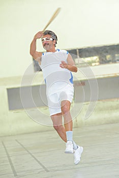 portrait man playing pala