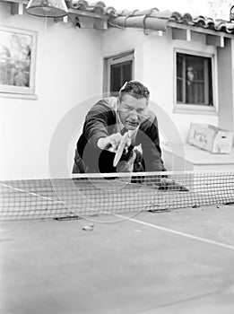 Portrait of a man playing table tennis