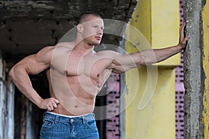 Portrait Of A Man Posing In Abondend Ruins