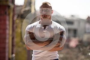 Portrait Of A Man Posing In Abondend Ruins