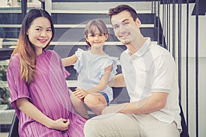Portrait of man and pregnant of wife, asian handsome father take care mother and kid with couple and expect maternity have a happy