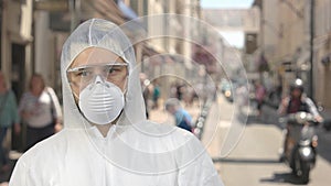 Portrait of a man in protective clothing standing downtown.