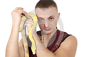 Portrait of man with python snake