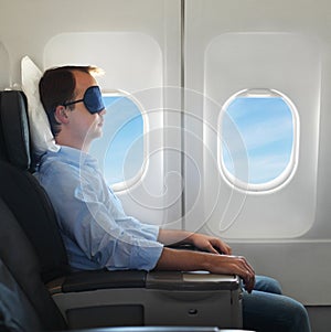 Portrait of man relaxing in the airplane