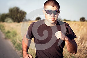 Portrait of a Man running protective goggles