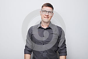 Portrait man smiling joyfully with happy face isolated on white studio background