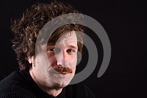 Portrait of a man smoking liar tobacco on white background