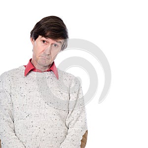 Portrait of a man in a sweater with a stupid look on his face